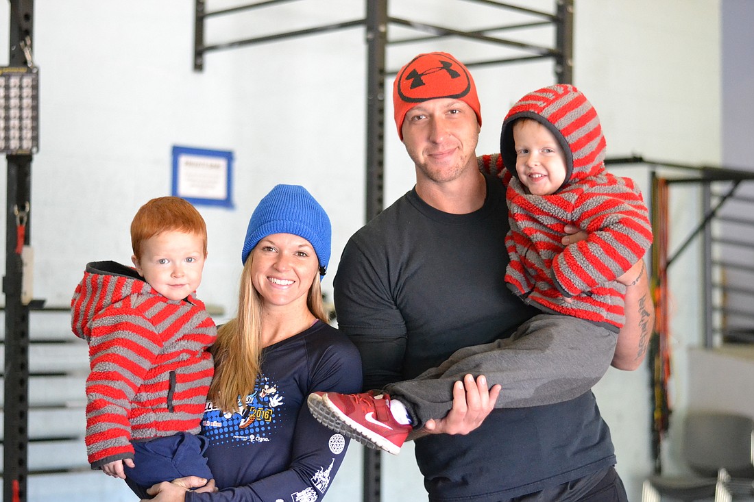 Claire and Stephen Kelley with their sons Langston and Kingston know the gym as home with as many classes that the pair teach.