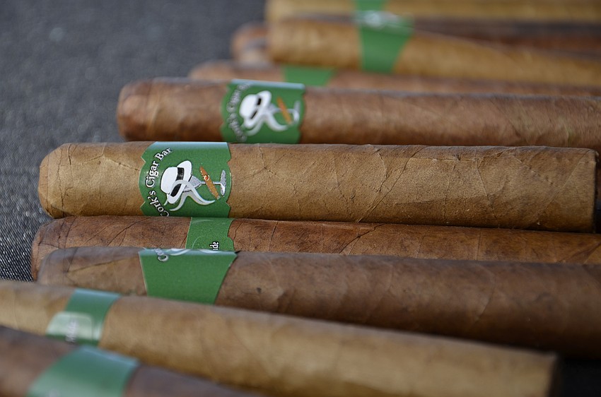 Cork's Cigar Bar of downtown Bradenton provided complementary  cigars for Chamber members at the shoot.