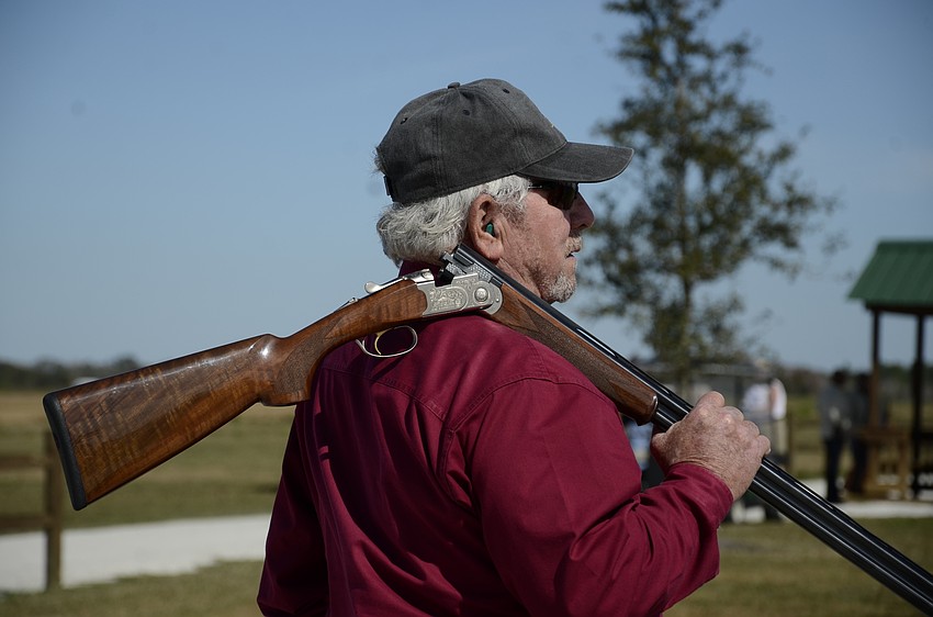 Gene Henshaw with Schroeder-Manatee Ranch waits his turn with his Beretta Silver Pigeon.