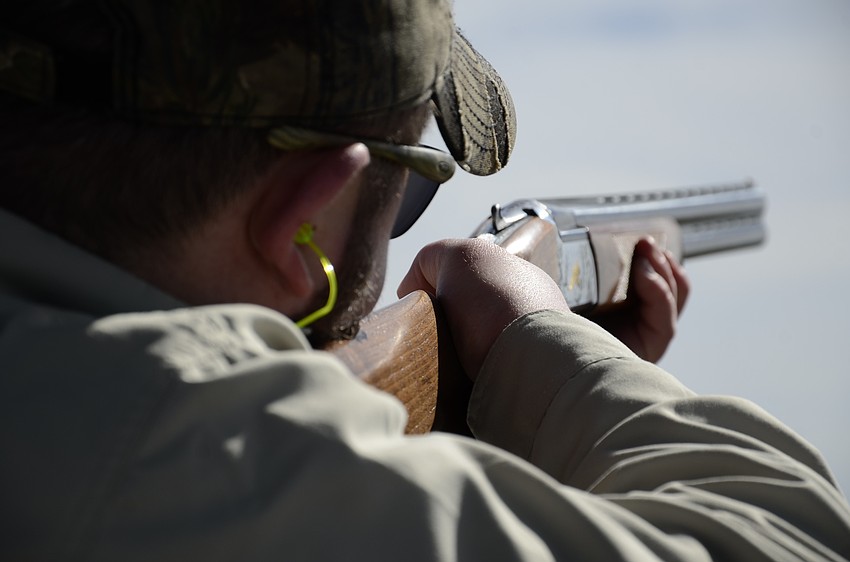 Heath Simpson with Cork's Cigar Bar aims for the clay.