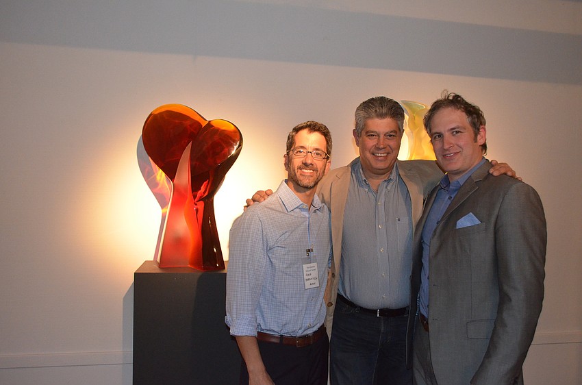 Glass artists Alex Bernstein and Latchezar Boyadjiev with Habatat Galleries President Corey Hampson