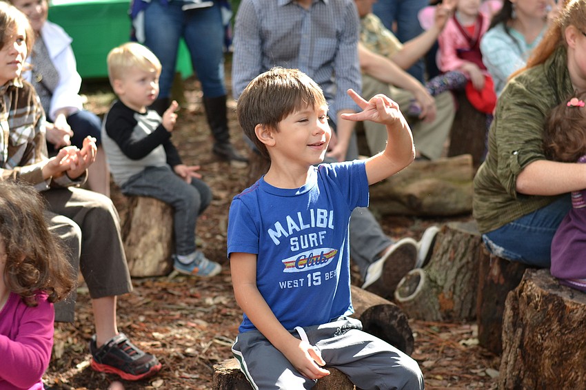 Martin Rosenbaum sings along with the song about challah bread.