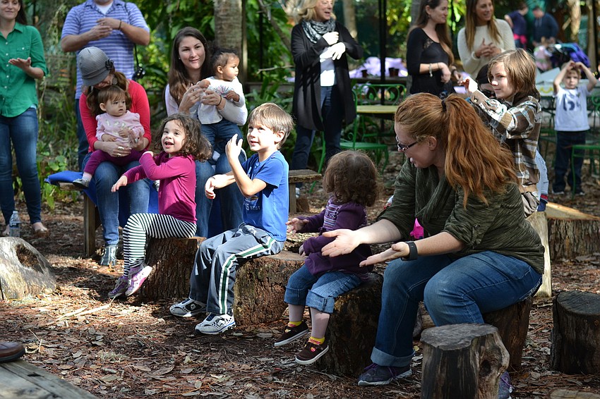 Parents and children sang and dance for the monthly Tot Shabbat hosted by Temple Emanu-El at the Sarasota Children's Garden.