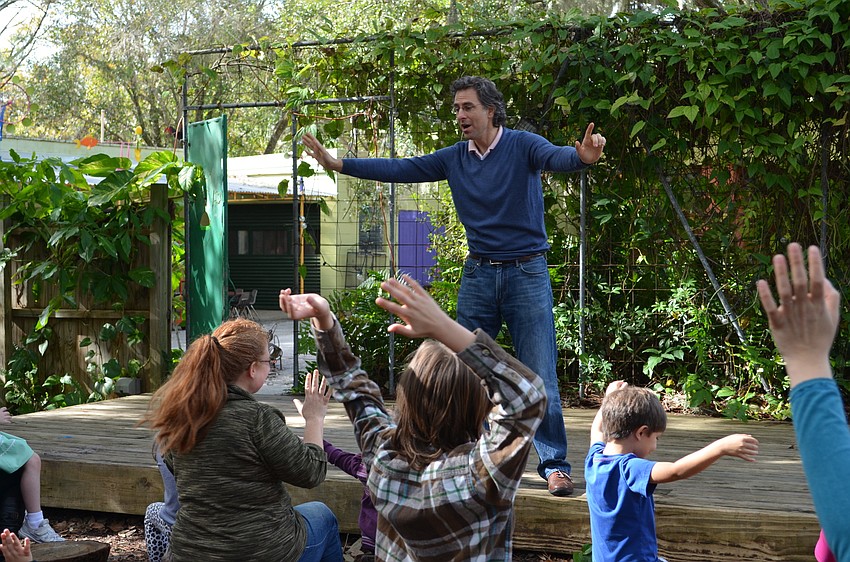 Rabbi Brenner Glickman leads the group in song and prayer to celebrate Tu B'Shvat.
