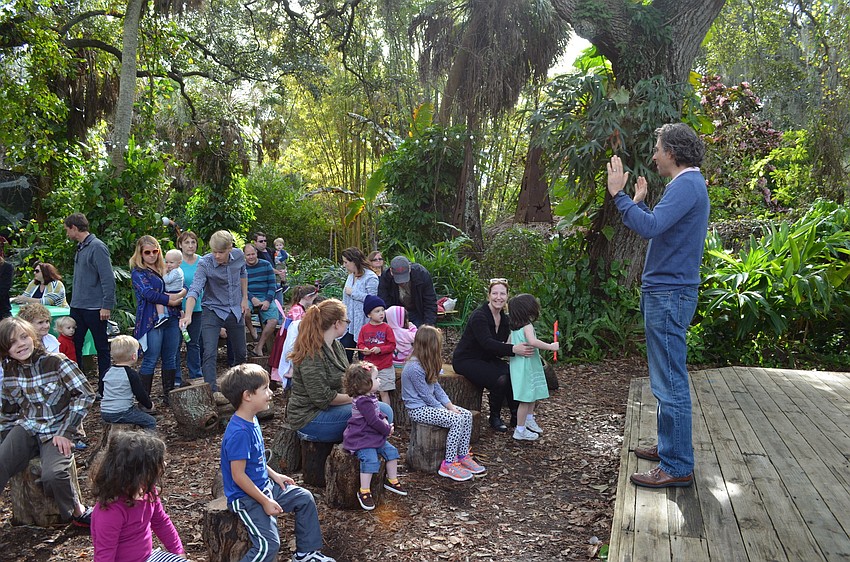 Rabbi Brenner Glickman leads the group in song and prayer to celebrate Tu B'Shvat.