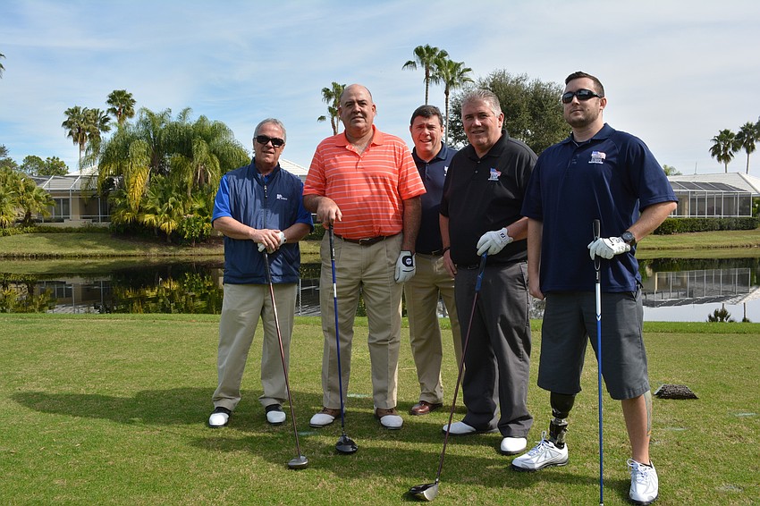 Sarasota's Pat Hogan and Dan Smith, Tim McHale and Chris Mitchell of Homes For Our Troops and Army Capt. Bobby Withers, played in a foursome of the benefit tournament.