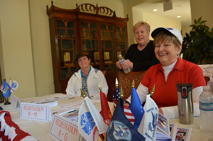 Judy Cline, Jeannette Anderson and Joyce Matthews, all of Rosedale, check in golfers at the Homes For Our Troops benefit at Rosedale Golf and Country Club.