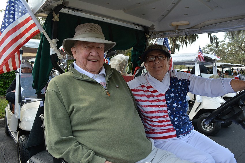 Jerry and Nancy Foley of Rosedale showed their patriotism before playing in the Homes For Our Troops benefit golf tournament.