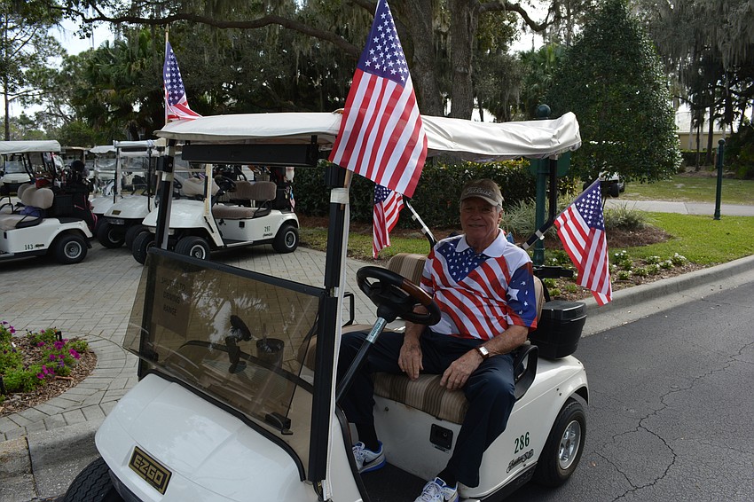 Rosedale's Gary Cole decorated his golf cart and ran a shuttle during the Homes For Our Troops benefit at Rosedale Golf and Country Club.
