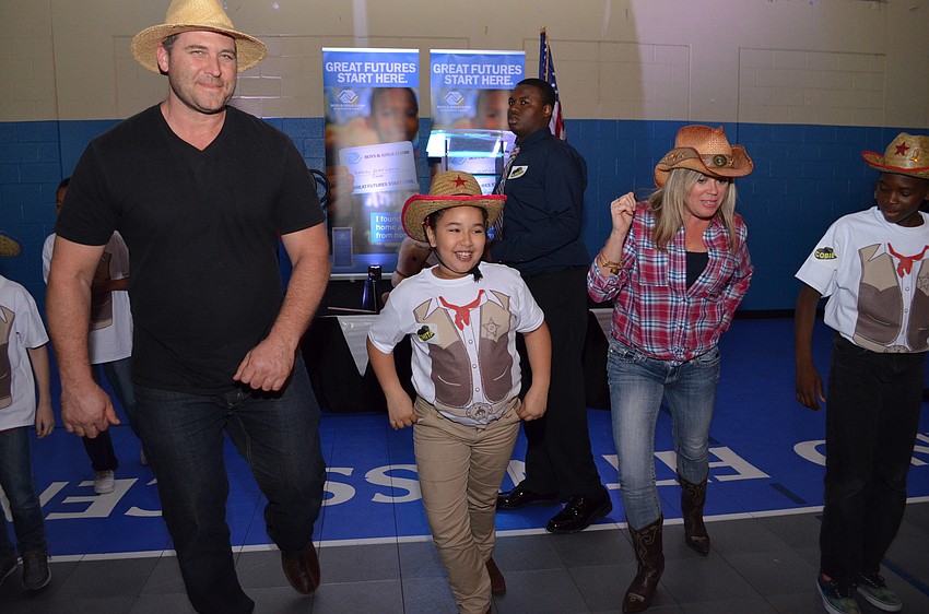 Dan Simpler, Ghita Demlak and Robyn Sadlo conclude dinner concluded with a dance of the 