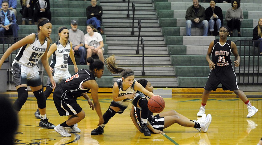 Lakewood Ranch sophomore Sarah Fazio dives for a loose ball in the first quarter.