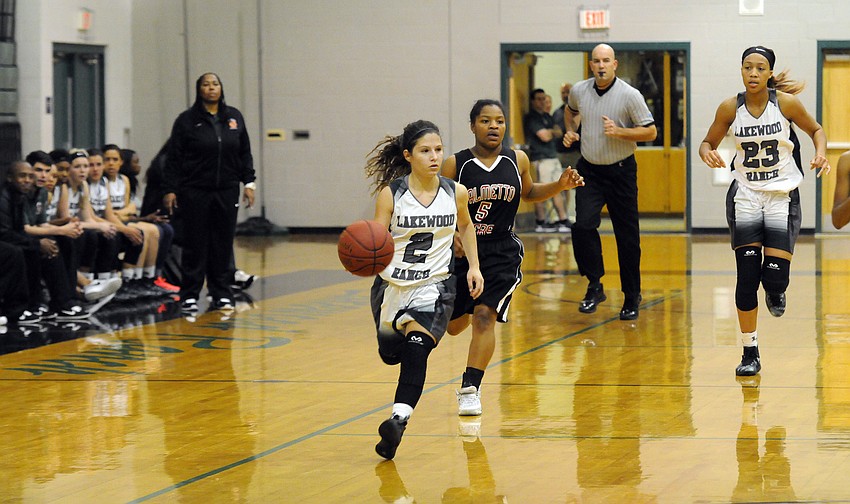 Lakewood Ranch guard Sarah Fazio brings the ball down the court for the Mustangs.
