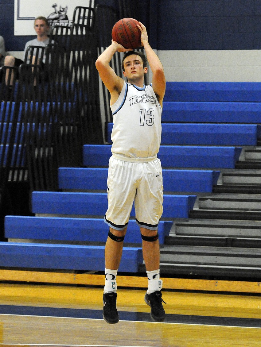 ODA junior forward Nate Patrick puts up a  3-pointer in the first quarter.