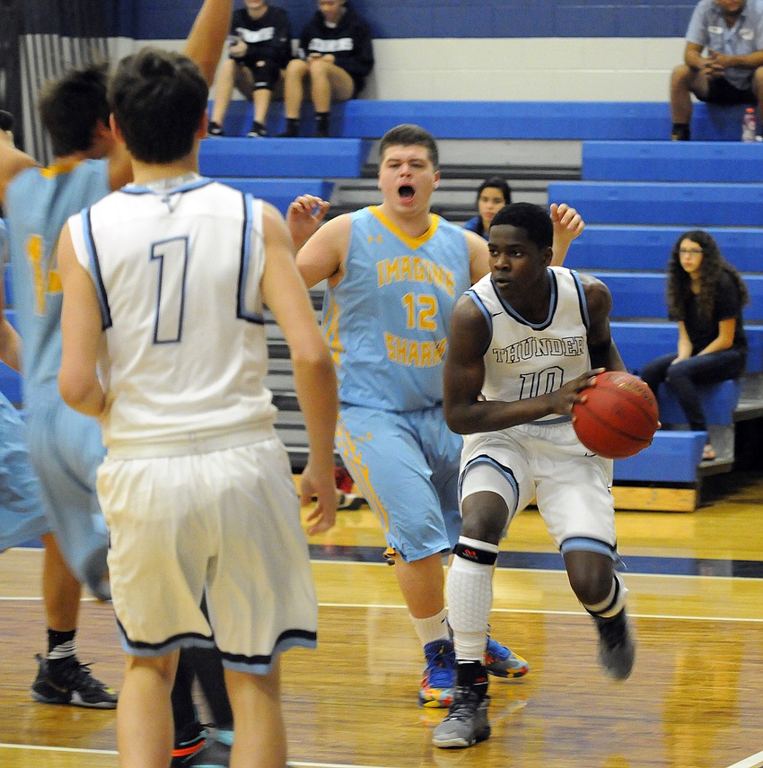 ODA junior Kolbie Ward drives to the basket in the first quarter.