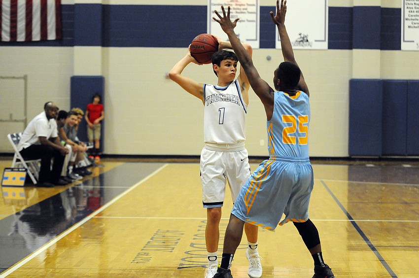ODA sophomore Chase Maasdorp looks to pass the ball in the first quarter.
