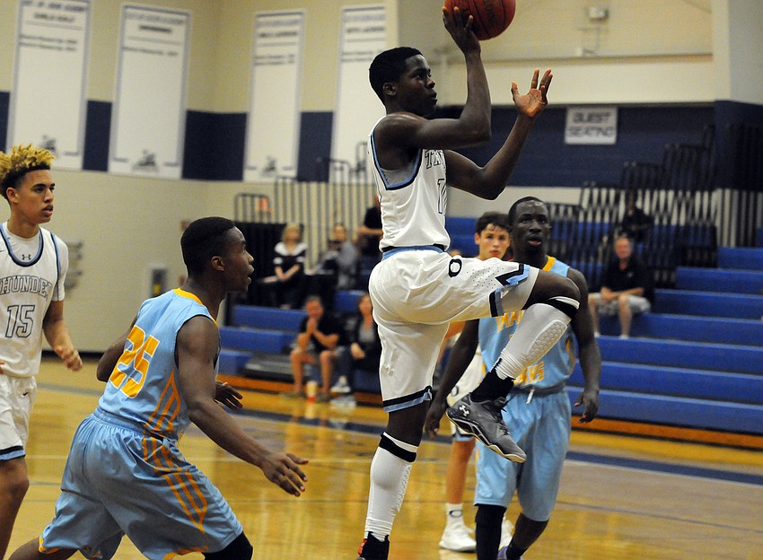 ODA junior guard Kolbie Ward puts up a shot in the first quarter.
