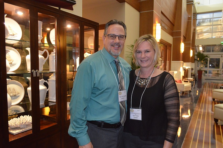 Retired Capt. Pat Ledwith and Capt. Corinne Stannish, of the Sarasota Police Department