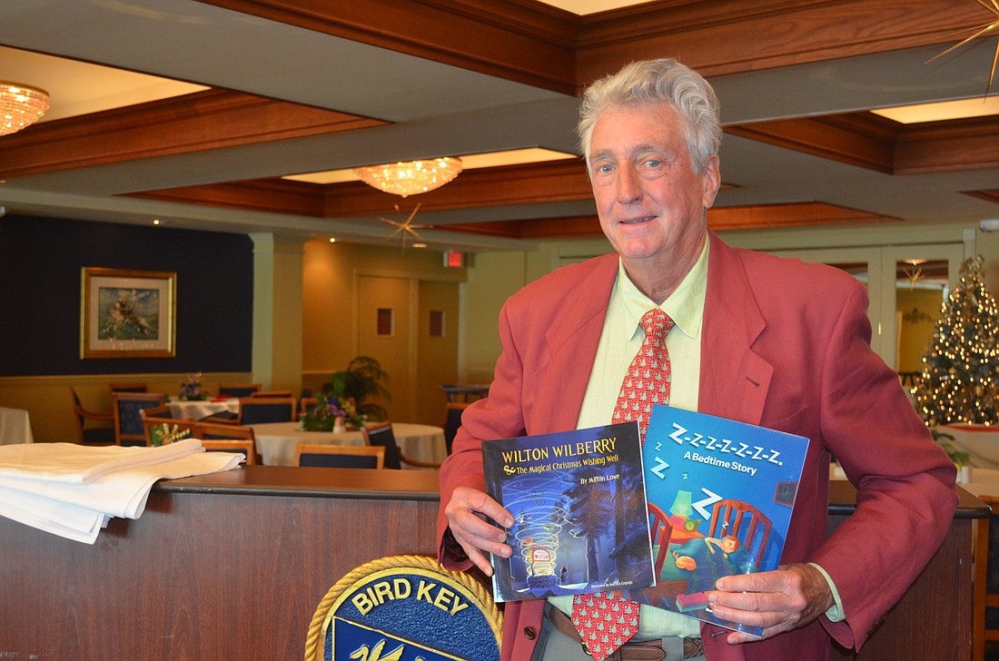 Al "Mifflin" Lowe with his books at Bird Key Yacht Club.