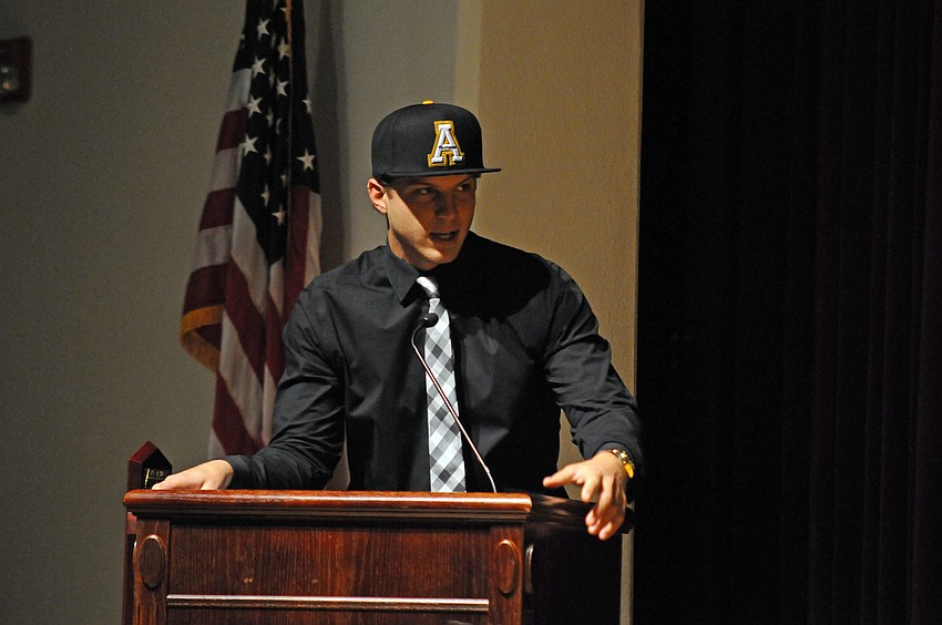 Braden River quarterback Jacob Huesman, who signed with Appalachian State University, got choked up when addressing his teammates.