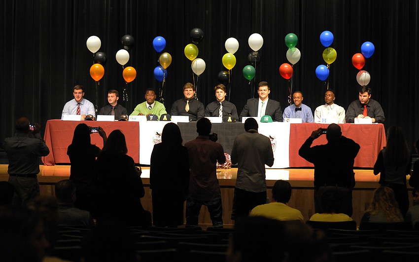 A record nine football players signed scholarships on National Signing Day Feb. 3.