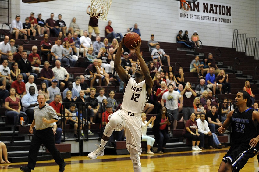 Riverview junior forward Brion Whitley threw down a pair of slam dunks in the opening minutes.