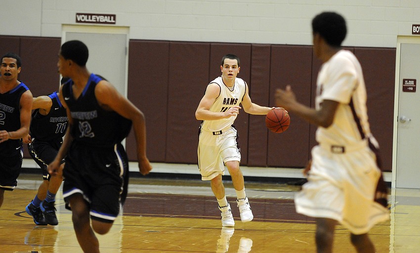 Riverview guard AJ Caldwell brings the ball up the court in the first quarter.