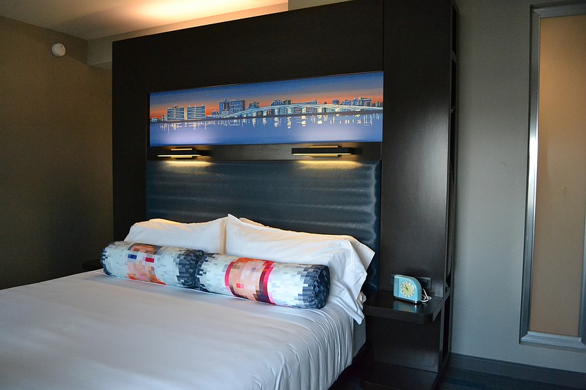 A single bedroom is set up an ready for guests. Each of the rooms is outfitted to maximize space.