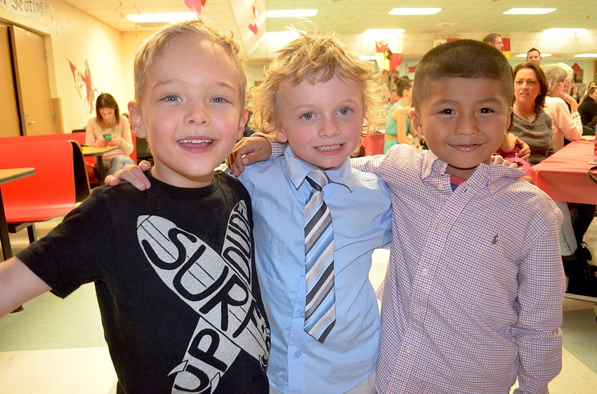 Christopher Zimmerman, Cpdy van Rye and Julio Mendez chased each other around the cafeteria.