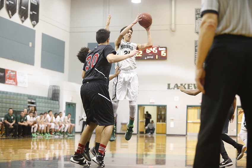 Lakewood Ranch sophomore guard Evan Spiller  attempts a 3-pointer in the first quarter.