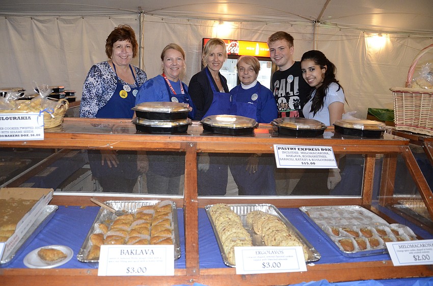 Lyn Zynda, Janet Rantis, Irena Jenkins, Joanne Lemire, Chris Rood and Inesse Chichou run the popular pastry booth.