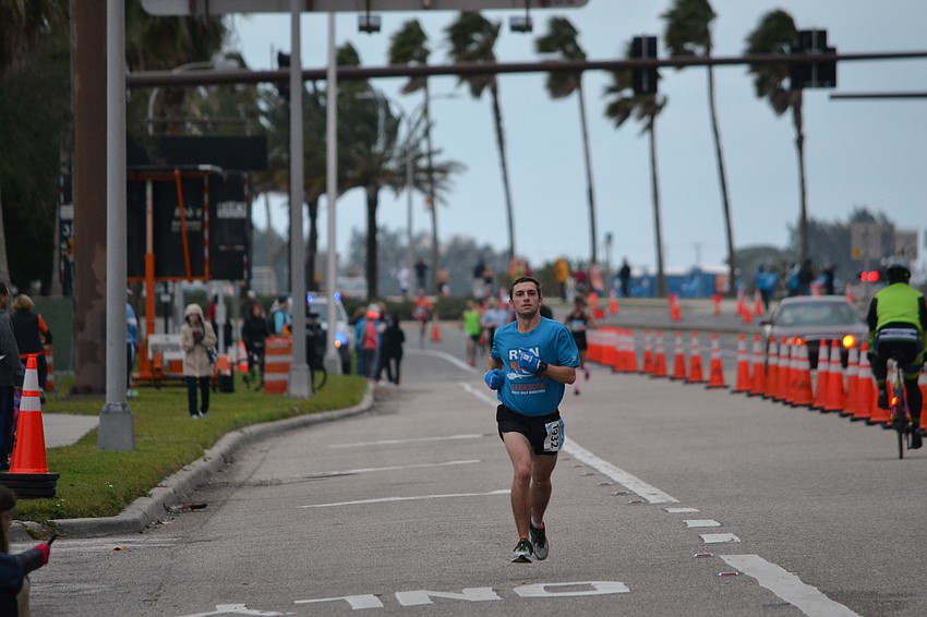 Runners come off of the Ringling Bridge before turning on to Bayfront Drive.