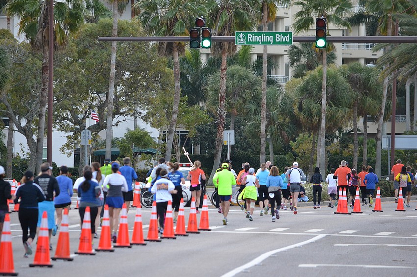 Runners approach Ringling Boulevard early Sunday morning for the 2016 Sarasota Music Half Marathon.