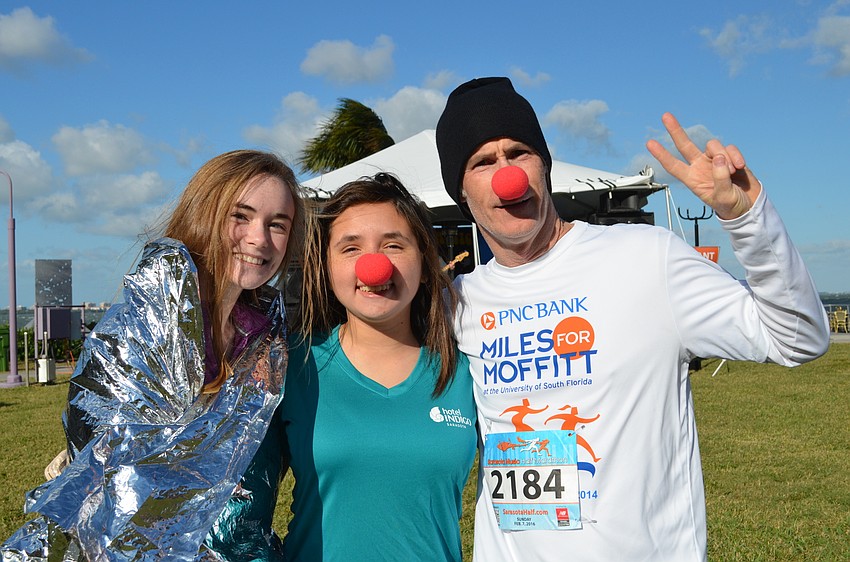 Mahree Medero, Sydnee Vance and Vinny Medero goof off at the after party.