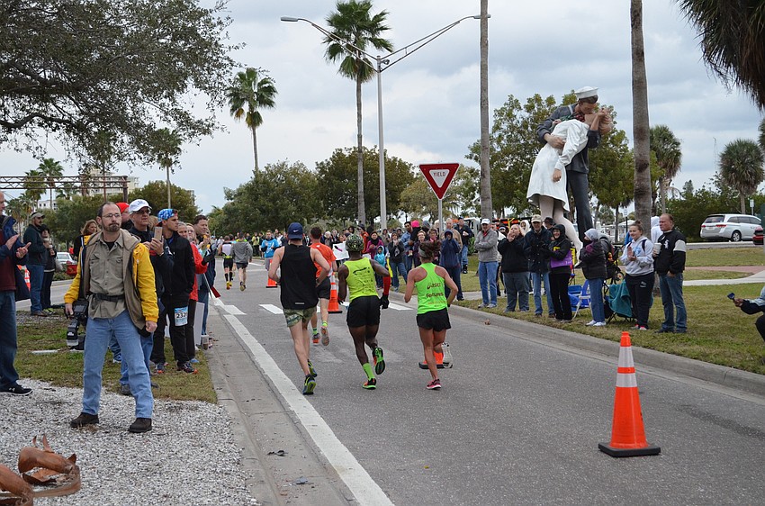 Supporters line both sides of the street near the Unconditional Surrender statue.