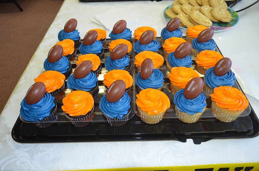 The lunch had Broncos-themed cupcakes.