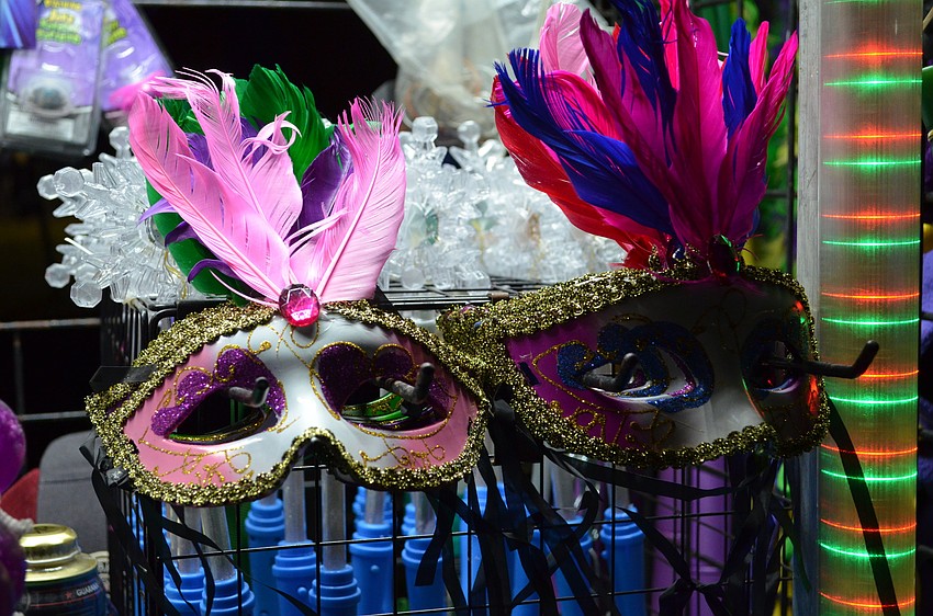 Masks with feathers are tradition for Mardi Gras parades.