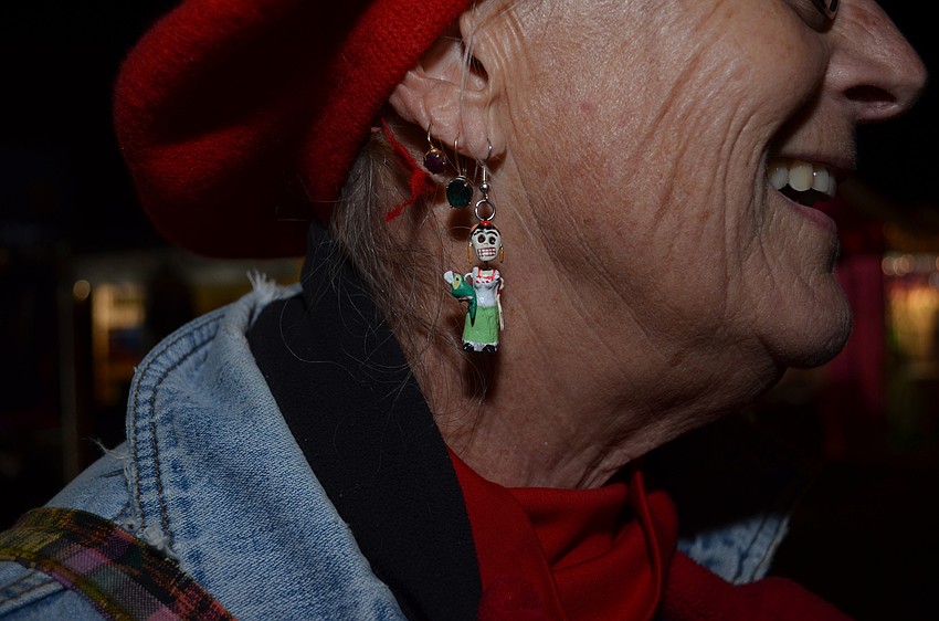 Mo Sheedy shows off her new earrings inspired by artist FridaKahlo.