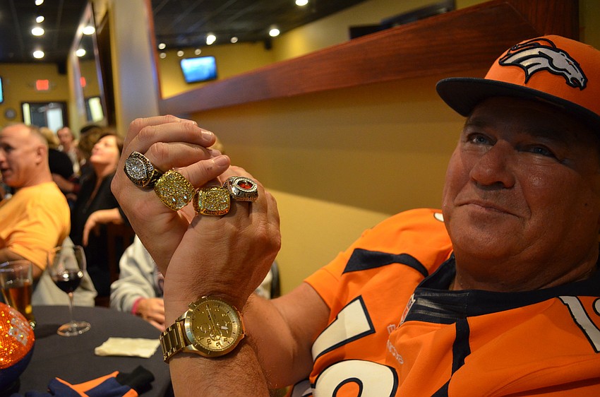 Bob Veazie is the ultimate Denver Bronco's fan with replica's of the Super Bowl rings from 1997 and 1998.