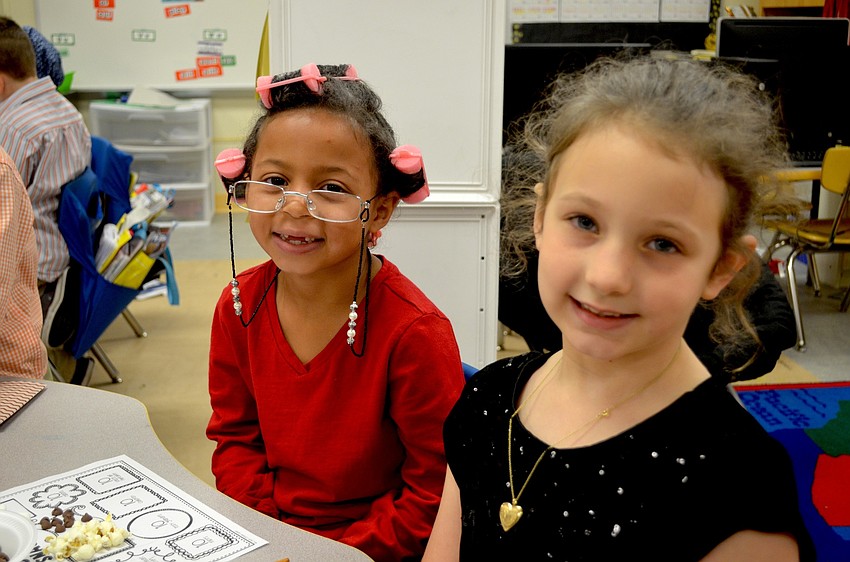 Aija Gonzalez and Charlie Kardoy had their moms help them spray paint their hair gray for the event.