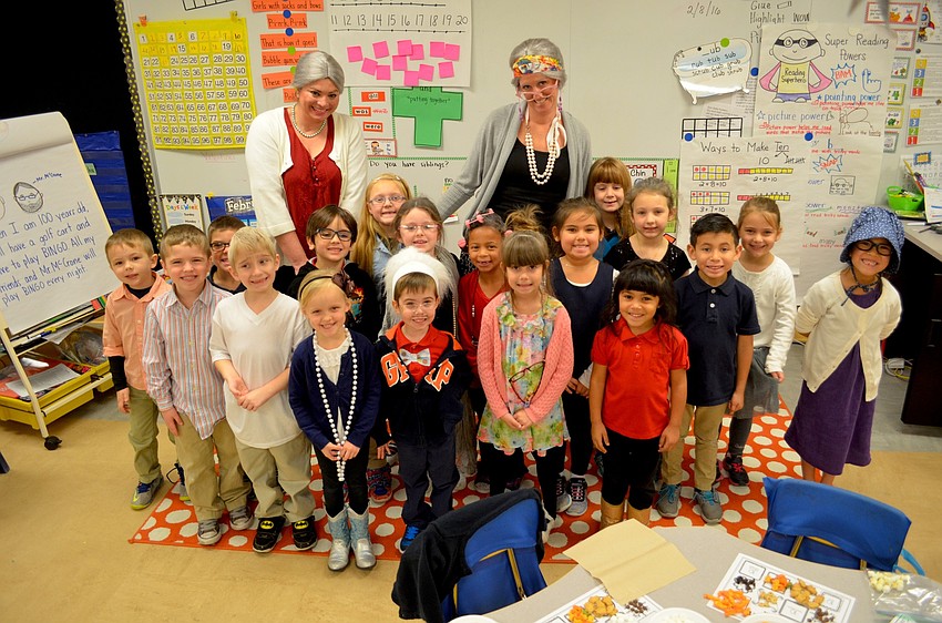 Cristina McCrone's kindergarten class shows off their outfits to commemorate the school's 100th day of the school year.