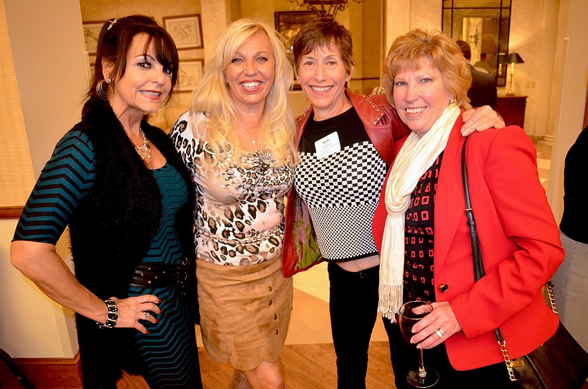 Lucianna Lanza, Wanda Martinetto, Ruth Harshman and Kathy Collums enjoy drinks and laughs.