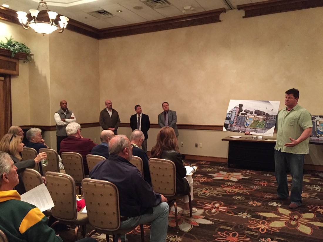 Troy Syprett presents his proposal for the Lido pool and pavilion at a workshop Tuesday evening.