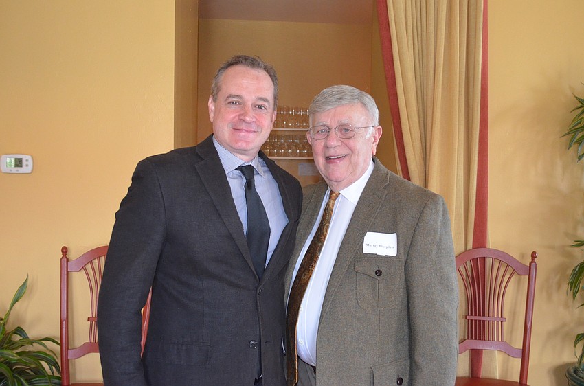 Frank Alcock, political commentator for ABC 7, and Democratic Club President Murray Blueglass