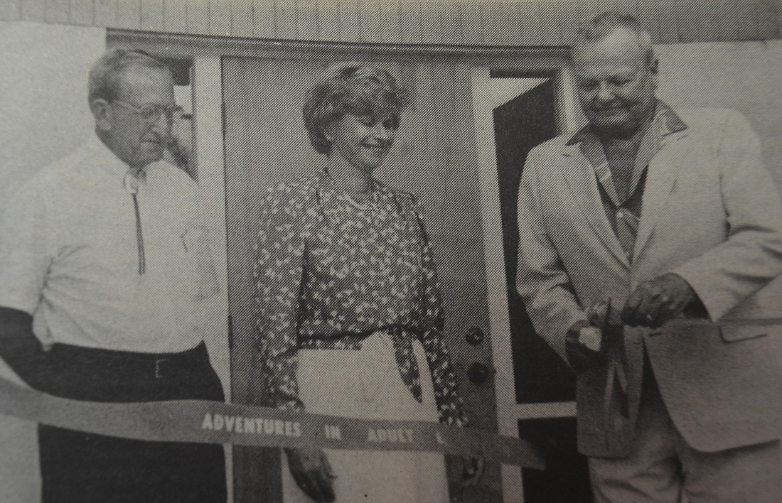 Longboat Key Town Commissioner Sid Ochs, Education Center founder Laura Taubes and Mayor James Edmundson cut the ribbon at the new Education Center in 1985.