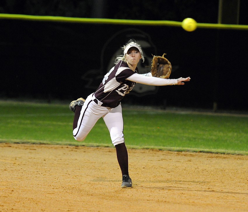 Braden River shortstop Linda Ross throws the ball to first base.