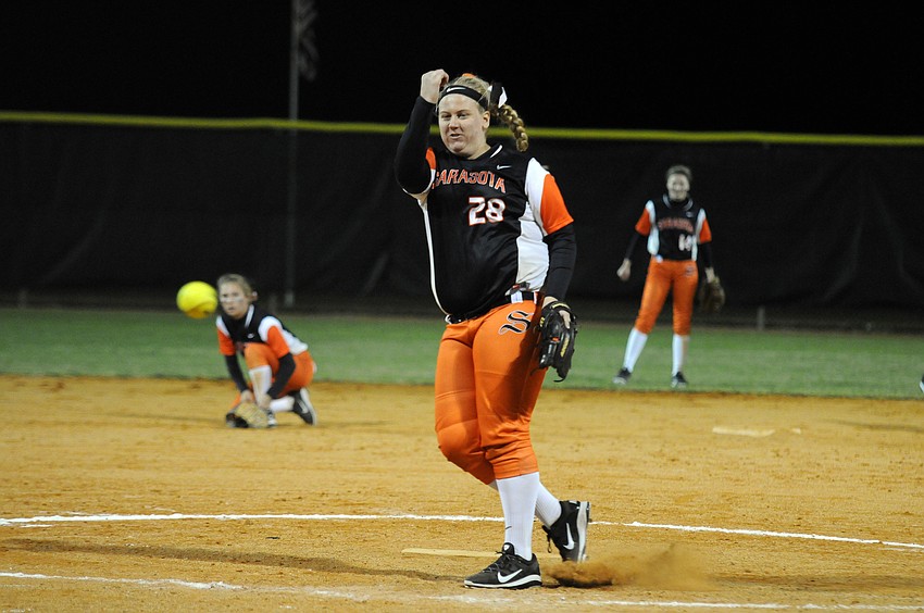 Sarasota pitcher Brittany Bendel warms up in between innings.