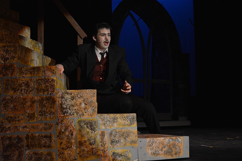 Jackson Helwege, as the Addams’ family patriarch, Gomez, laments about keeping a secret from his wife.