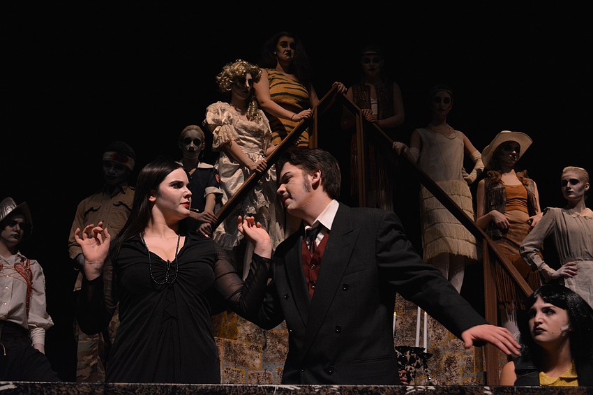 Jackson Helwege and Sarah Cox, as Gomez and Morticia Addams, fight about a secret Gomez is keeping. Jackson Helwege and Sarah Cox, as Gomez and Morticia Addams, fight about a secret Gomez is keeping.