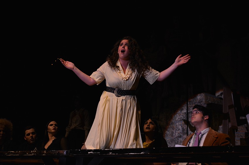 Olivia LaFemina, as Alice Beineke, has strong reaction to something put in her drink.