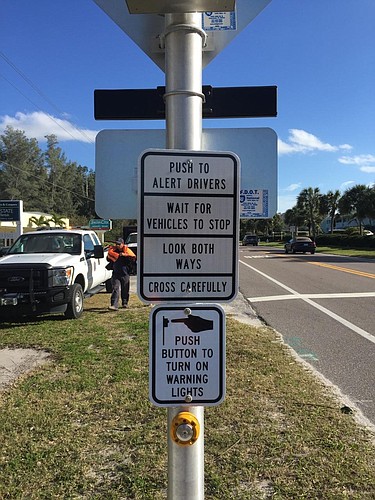 The town of Longboat Key purchased new crosswalk signs and installed them Feb. 10 to speed up the bureaucratic process.